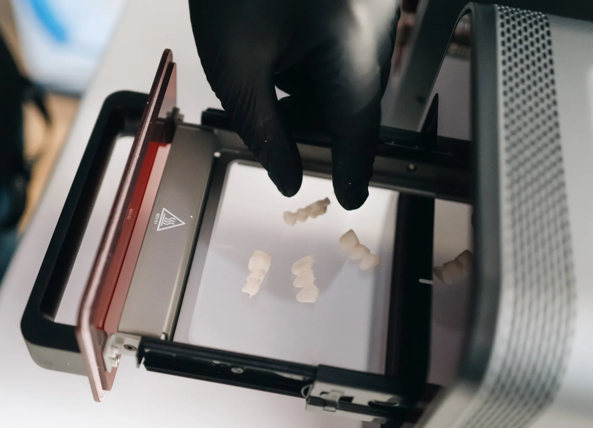 Restorations on the build plate of a 3D printer